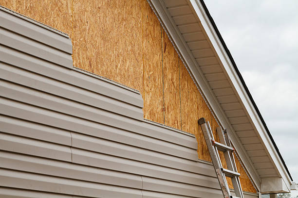 Professional Emergency Siding Repair technician working in Locust, NC